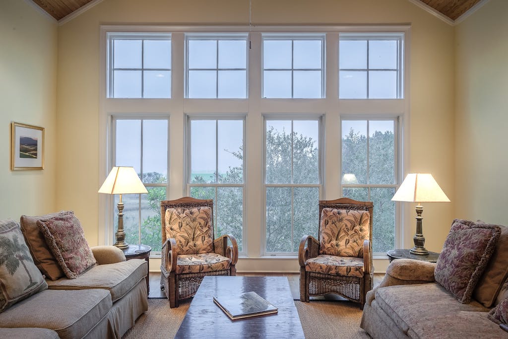 Brown Wooden Coffee Table With Couches and Chairs